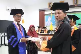 Rudy Fadrial Raih Gelar Doktor, Bupati Rohul: Selamat Sukses Lewati Sidang Promosi Doktor UNRI