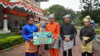 Pj Bupati Langkat Pimpin Upacara HUT ke-275 Kabupaten Langkat: Dorong Pertunjukan ASN dan Bagikan Santunan